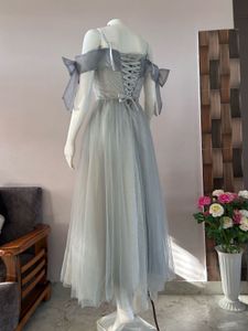 Greyish blue off shoulder with golden shimmer