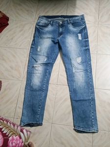 Distressed Blue Denim Jeans