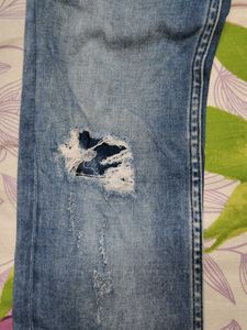 Distressed blue denim jeans 👖
