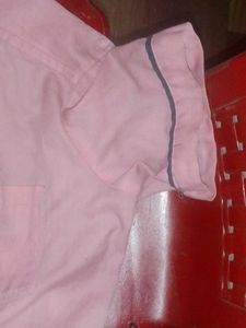 Pink Tshirt With Grey Lones On The Buttons &amp;Handsn