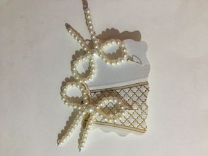 Pearl Bead Bow Dangling Earrings