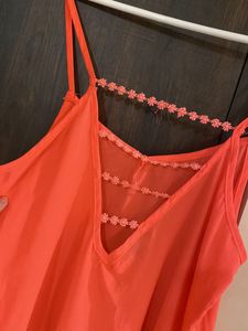 Coral Tank Top with Ruffle Detail