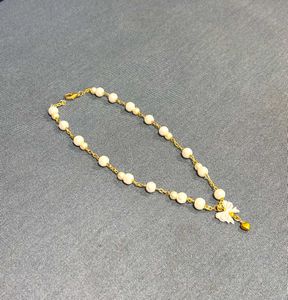Pearl and Bow Charm Necklace