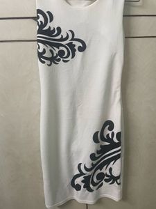 White Dress with Black Floral Detail