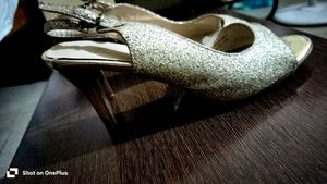 New sparkly gold stilettos.