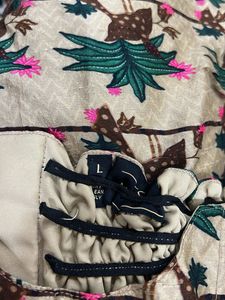 LABEL AYUSHI SHAH BONNING PANTS AND GREEN TOP