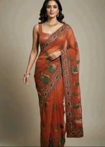 unusedElegant Orange Paisley Saree