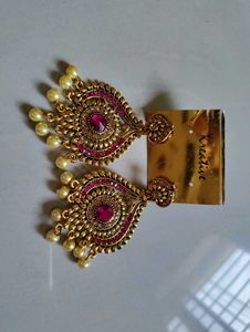 Statement earrings with pink stone and pearl