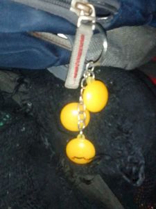 Yellow Three Smiled Locket For Backpack
