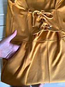 Mustard Jumpsuit with Lace-Up Detail
