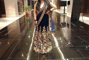 Very Preety Blue And Gold Lehanga Set
