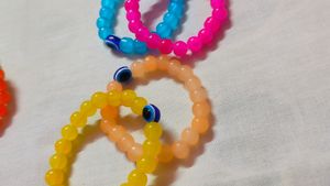 Colorful Beaded Bracelets with Evil Eye Detail (Se