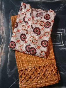 Mustard/Gold Pant And Off White Kurti.