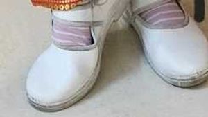 Used white school shoes
