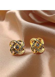 Elegant Gold Tone Stud Earrings