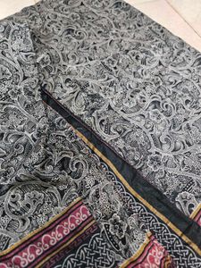 black Saree with beautiful patterns