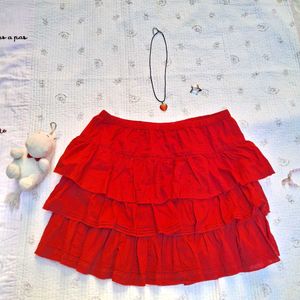 red ruffled short skirt