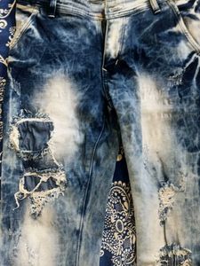 Distressed Blue Denim Jeans