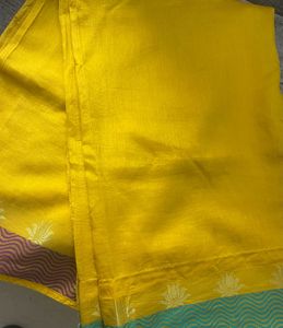 Elegant Bright Yellow Saree with lotus motifs