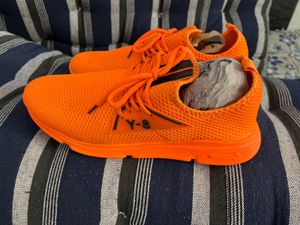 Orange sports shoes for mens