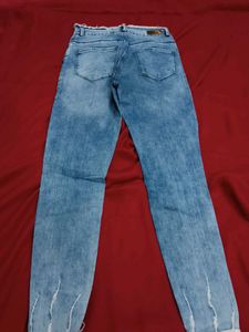 Ripped Knee Denim Jeans