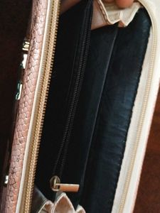 Elegant Pink Clutch with Animal Detail