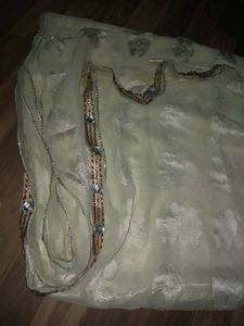 White Saree With Blouse And Peticoat