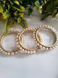 Pearl Bangles. 4