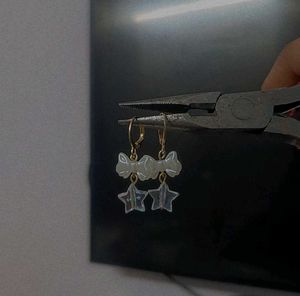 Acrylic bow and Star golden Earrings