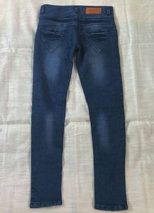 Distressed Patch Denim Jeans