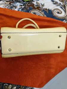 butter yellow handbag