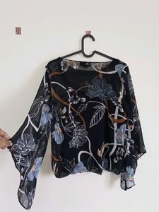 Branded floral sheer top with attached camisole