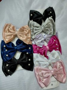Satin bow clip with pearls