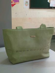 Stylish Light Green Handbag with Studded Detail