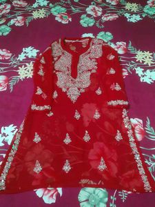 Red Lucknowi kurta set with inner tape