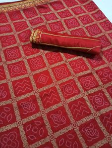 Red Saree With Golden Print Work