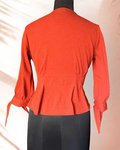 Rust Orange Peplum Top