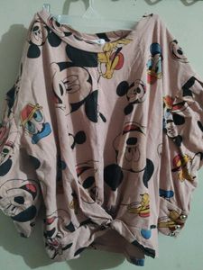 A Crop Top With Elegant Front Knot Nd Puff Sleeves