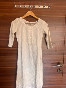 Elegant White Embroidered Kurti