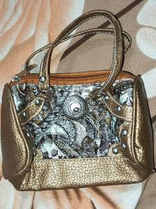 Unique Bronze-tone Handbag