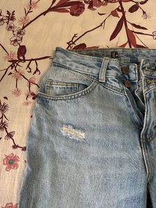 Ripped Light Wash Jeans
