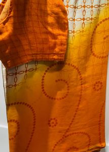 Orange sari with stitched blouse