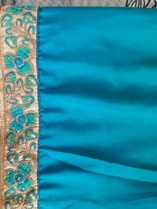 Saree With Deep Neck Blouse