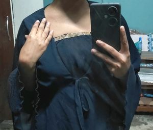 Elegant Blue Top with Embellished Neckline