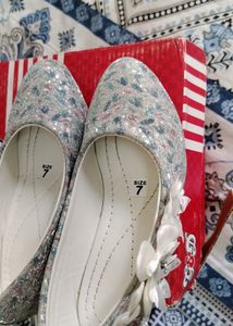 White Cinderela Shoes.