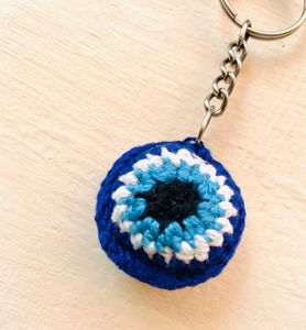 This is 🧿Evileye Keyring Not Earring.....