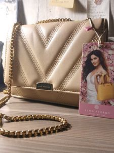 Lino Perros Quilted Sling Bag