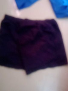 Blue salwar and black shorts