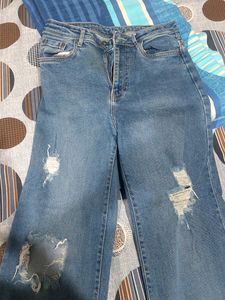 Ripped Blue Denim With Strechable Material .