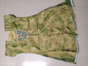Unused Green And Gold Floral Net Chudidhar